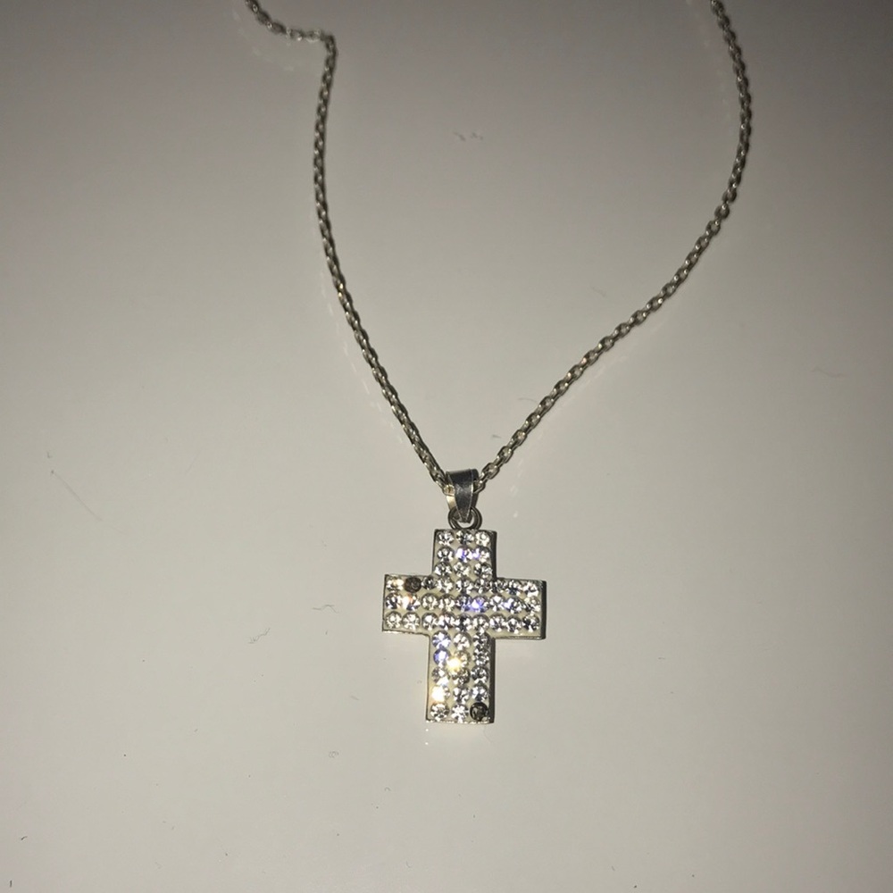Cross and missing two stones